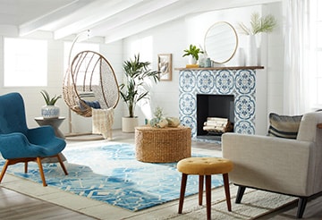 Light and airy living room with a blue and white palette and nautical accents